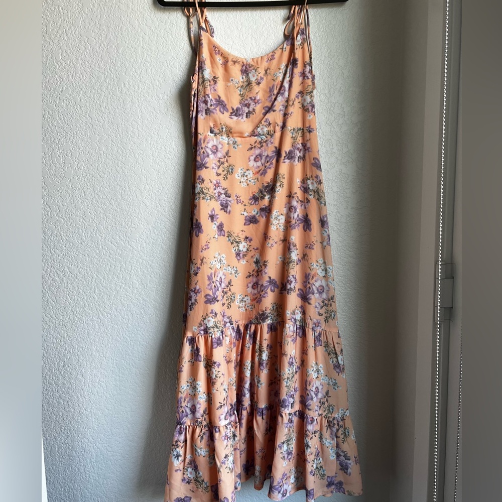 Lulu’s peach colored, floral dress with tie, adjustable straps and zip up back